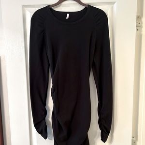 Moda international ruched side, long sleeve black dress